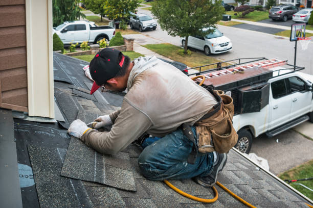 Professional Roofing technician working in Astoria, IL